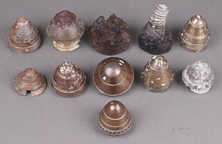 Eleven recovered First World War shell nose cones 