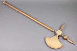 A reproduction brass halberd 93cm 