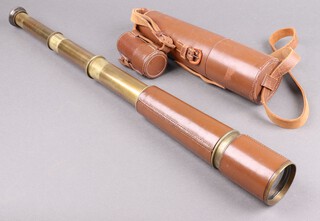 A BC Limited and Co. military issue brass and leather 3 draw telescope  marked Tel.Sct.Regt Mk.2 10818 0.S.126 GA with broad arrow and leather carrying case 