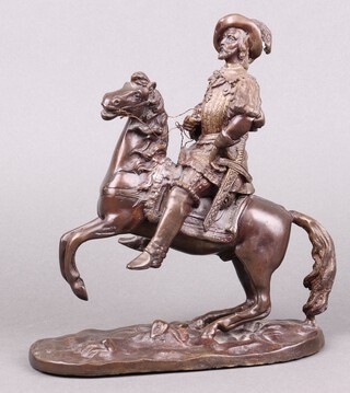 A 20th Century bronze figure of a mounted Cavalier on an oval base 26cm h x 21cm w x 9cm d 