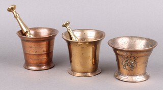 A 17th Century brass mortar decorated a crowned Tudor rose 12cm together with 2 other mortar and pestles (1 misshapen) 