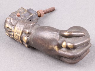A Victorian bronze door knocker in the form of a clenched female hand with ball 11cm 