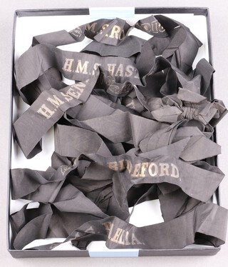 Eight Royal Navy cap tallies - HMS Dahlia, HMS Bideford, HMS Clematis, HMS Volunteer, HMS Lupin, HMS Hastings, HMS Endeavour, HMS Iroquois