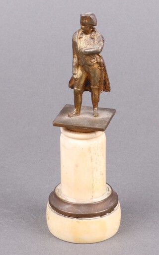 A 19th Century gilt metal figure of a standing Napoleon, raised on a turned bone column 15cm 