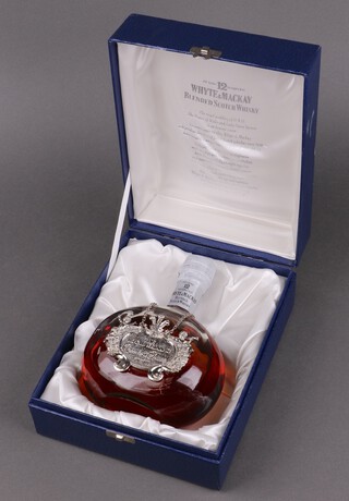 A 75cl bottle of Whyte & Mackay 12 year old blended Scotch whisky to celebrate the wedding of HRH The Prince of Wales and Lady Diana Spencer 29th July 1981, cased 