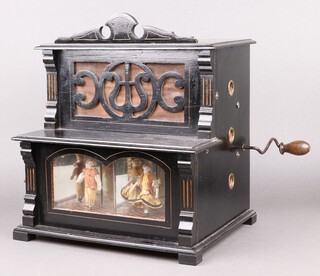 A late 19th century German hand cranked Polyphon with porcelain automaton figures contained in an ebonised case. The case a facade of a building,  having an upper section speaker set behind ebonised fretwork frame, the lower glazed section with pair of male and female porcelain figures affixed to ebony and pine chequered 'floor' with mirrored 'walls'. 6 nine inch discs accompany the player, 30cm h x 32cm w x 37cm d