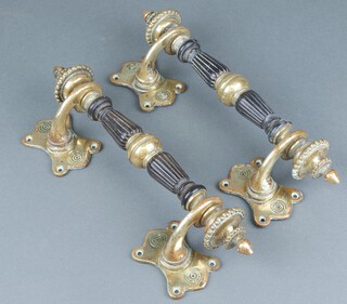 A pair of mid 19th Century brass and ebony door handles by Richard Evered & Sons, the back marked RE&S,  4266