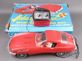 Topper Toys, a Johnny Speed Giant Sized remote controlled racing car together with box and original insert  52cm l 