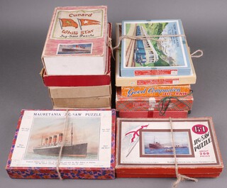The Betall jigsaw "Mauretania", a Cunard jigsaw "RMS Queen Mary", 3 GWR jigsaws and 6 others 