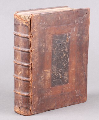 A late 17th century collection of Sermons (mainly 1680/90's), the boards bound in contemporary blind tooled 3 frame black and brown calf with the corners having floral motifs, the raised spine with 5 bands, 8vo