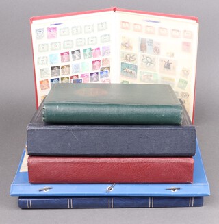 An album of GB stamps Victoria to Elizabeth II including penny black, penny reds, an album of stamped envelopes, an 1859 stamped envelope, a green Pelham album of world stamps - India and GB, a red stock book of world stamps, 1 other stock book of GB stamps and a ring file of Elizabeth II mint GB stamps 