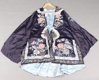 A Chinese 19th Century blue silk and embroidered robe 