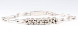 A diamond set  white metal  bracelet, 19cm, 12.1g