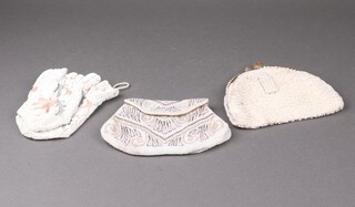 A bead work purse 12cm x 16cm, a bead work script purse 13cm x 14cm and 1 other 16cm x 16cm 