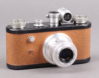 A Corfield Periflex 1 Camera in brown pigskin within fitted hard leather case, with Lumar 50mm f/3.5 lens, serial no 2266  

