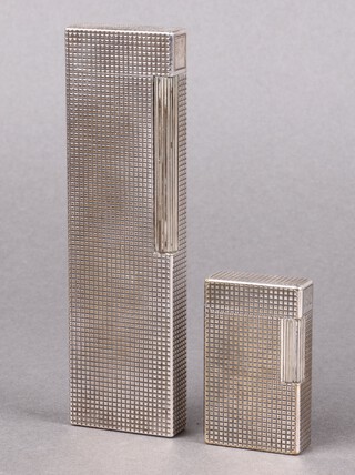 A Dupont silver plated table lighter, the base marked 017140  14cm h x 3cm w x 1cm d  and 1 other monogrammed JJC 55cm 