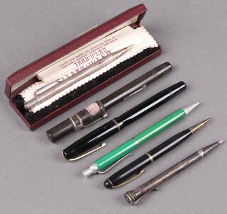 A silver Yard O Led propelling pencil London 1955, a Waterman Ideal fountain pen with green case, a black fountain pen with warranted 14ct gold nib, a Burnham propelling pencil, an Eversharp propelling pencil and a green cased ditto 