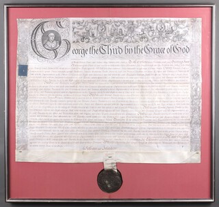 A George III  framed agreement, headed  - George The Third By The Grace of God, followed by lines of text and having a large seal to the bottom 75cm h (including seal) x 80cm w