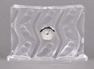 Lalique, a "Clock Hulotte" crystal table timepiece, the curved glass case moulded with owls, etched 'Lalique France' to bottom right hand front corner 9cm h x 12cm w 