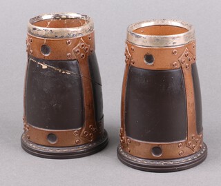 A pair of Doulton Silica vases in the form of leather buckets 11cm, bases impressed Doulton Silica 6770 