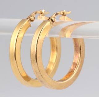 A pair of gold marked 375 hoop earrings 2.9g