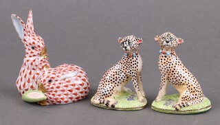 A Herend Hvngary porcelain figure of 2 seated rabbits 9cm together with a pair of Basil Mathews figures of seated leopards 7cm 