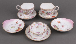 Two Dresden boat shaped tea cups with floral decoration, 1 marked 2712 to the base together with 4 scallop shaped saucers with floral decoration, base incised KT247, a circular Dresden floral patterned plate with gold mark to the back 13cm, a floral patterned bowl 9cm (chipped)