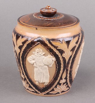 A Doulton Lambeth salt glazed tobacco jar decorated monks, the base impressed Doulton Lambeth NN 11cm, minor chips to the top 