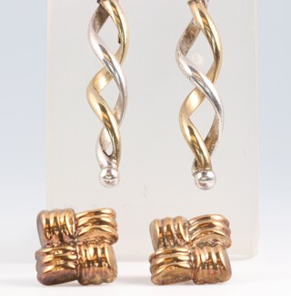 A pair of white and yellow metal twist drop earrings and a pair of square shaped yellow metal earrings, 3.8g gross