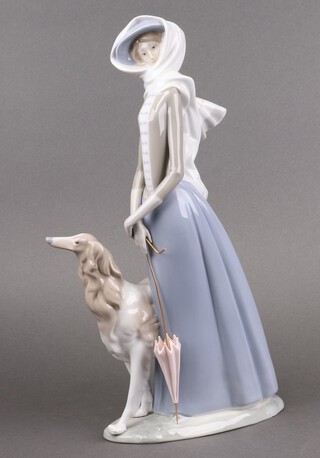 A Lladro porcelain figure, Lady with Greyhound 4594 40cm 