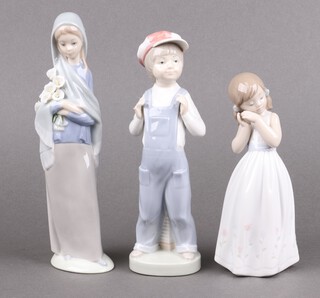 Three Lladro figures - Girl with Calla Lillies 4650 23cm, My Sweet Princess 6973 and Boy From Madrid 4898 21cm (finger a/f) 