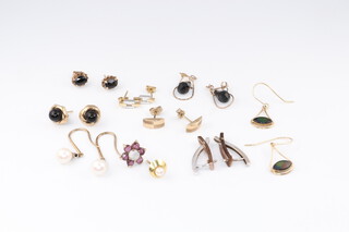 A pair of gold marked 14k hardstone set earrings (0.9g), A pair of 9ct gold and cultured pearl earrings (1.4g), a pair of 2 colour gold marked 375 earrings (2.4g, a pair of ear studs (0.8g), a pair of gold testing as 9ct ear studs set hardstone (0.7g) 3 pairs of gilt metal earrings and 2 odd earrings