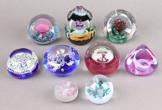 Four Caithness limited edition glass paperweights - Aztec Rain Flower, Pebble, Miniature Moon Flower, Space Beacon, a Selkirk paperweight and 4 other paperweights 