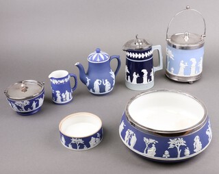 A Wedgwood blue Jasperware cylindrical jar and cover with silver plated lid, mounts and swing handle 8cm, a Jasperware bowl impressed Wedgwood with silver plated mount 21cm (mount loose), a ditto biscuit barrel with plated mounts 15cm, coffee pot 15cm, cream jug 9cm, bowl 11cm (missing mount) and a Copeland Spode jasperware style jug with Britannia metal lid 17cm 