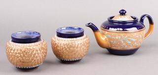 A Royal Doulton blue salt glazed teapot 7491 10cm together with 2 small jardinieres 10cm impressed 6977 Royal Doulton (1 has chip to base and 1 has a crack) 