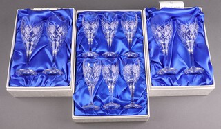 Four Royal Doulton flute shaped wine glasses contained in 2 boxes together with a set of 6 sherry glasses, boxed