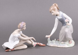 Two Lladro porcelain figures, Rose Ballet 01005919 11cm and Girl Gathering Flowers 1172 19cm 