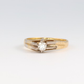 A gold marked 18ct single stone diamond ring 3.3g