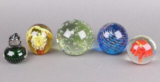 A bubble glass paperweight (some scratches) and 4 other paperweights 