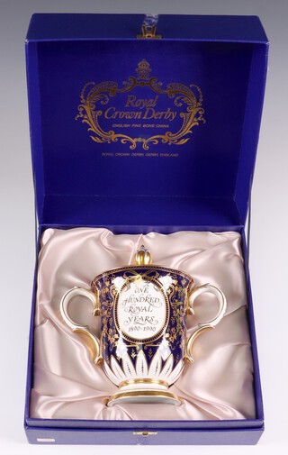 A Royal Crown Derby  limited edition 100 Royal Years, twin handled loving cup and cover, no.66/100, cased