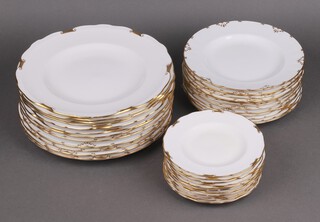 A Royal Crown Derby 22 piece Regency pattern dinner service comprising 6 dinner plates (2 ring flat), 5 similar Royal Crown Derby  dinner plates, 4 side plates, 8 similar side plates, 12 tea plates (3 ring flat), the reverse marked A.1075XXXIV 