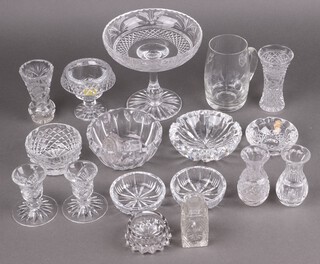 A pair of Waterford Crystal cut glass stub shaped candlesticks 8cm, a cut glass pedestal bowl 16cm and a collection of Waterford and other glassware including ashtrays, vases, etc 