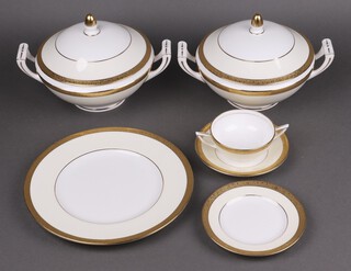 A 42 piece Minton Westminster pattern dinner service comprising 2 tureens and covers, 6 dinner plates, 9 side plates, 7 tea plates, 9 saucers, 6 twin handled soup bowls (1 bowl rings flat), tea plate, together with 2 similar saucers, 3 Royal Doulton Royal Gold dinner plates (seconds), ditto tea plate, a Coalport gilt banded plate and 2 Mintons tea plates