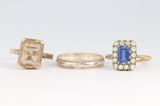 A gold marked 9ct paste set ring size N, 2.7g, a white metal wedding band size Q and a yellow metal and citrine set dress ring size J