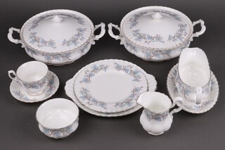 A 69 piece Royal Kent Trentside pattern dinner/tea service comprising 3 twin handled tureens and covers, oval meat plate, 10 dinner plates, 10 side plates, 10 medium plates (2 ring flat), sauce boat and stand, 10 tea plates (1 rings flat), 2 bread plates, milk jug, sugar bowl, 10 cups, 9 saucers 