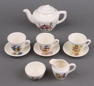 A child's Noddy patterned 9 piece tea service with transfer decoration, comprising teapot (chip to lid), cream jug (cracked), sugar bowl, 3 cups and 3 saucers 