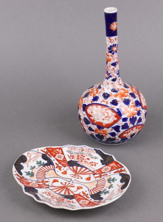 A 19th Century Japanese Imari bottle vase 24cm together with an oval dish (chipped and stuck) 