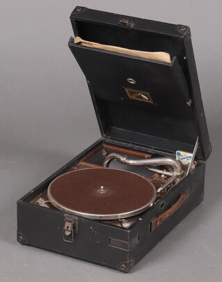 An HMV portable manual gramophone in a black fibre case 14cm h x 29cm w x 41cm d together with a collection of 78rpm records 