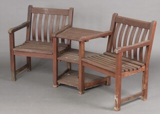 A slatted hardwood garden "tete-a-tete" bench 86cm h x 182cm w x 54cm d 