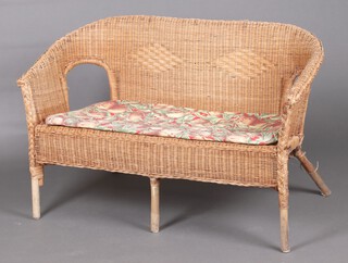 A wicker work 2 seat settee 